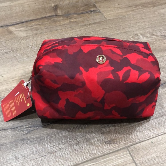 lululemon athletica Handbags - NWT! - LULULEMON Feeling Ready LARGE Pouch NEW YEAR - BUNNY CAMO & GOLD LOGO